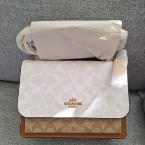 TABBY SHOULDER SLING